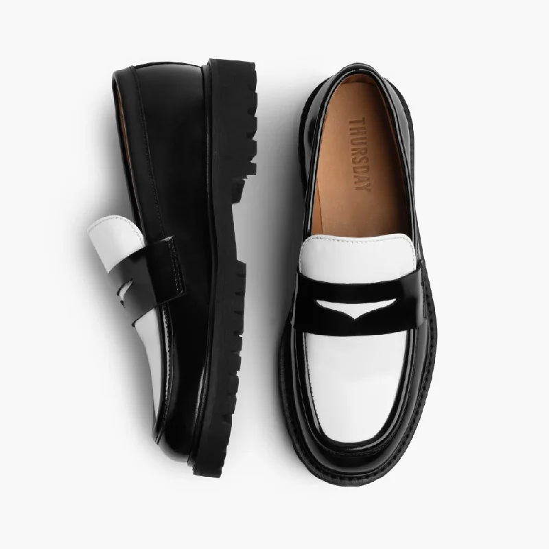 womens-penny-loafer-lug-sole-black-white-leather