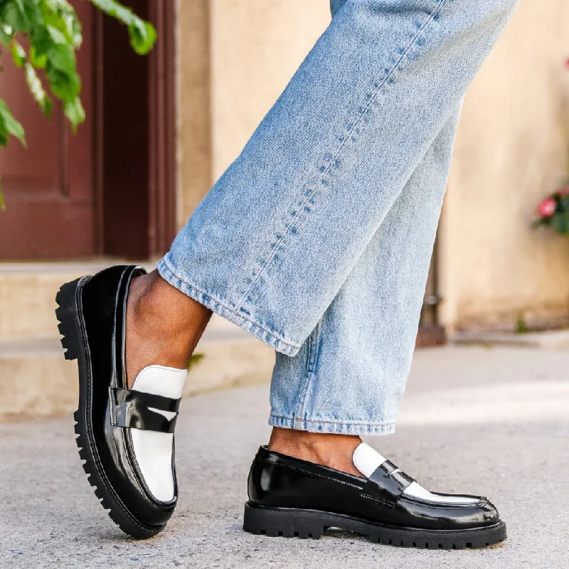 womens-penny-loafer-lug-sole-black-white-leather