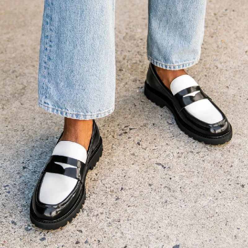 womens-penny-loafer-lug-sole-black-white-leather